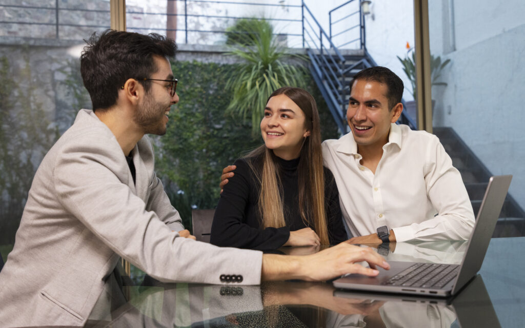 medium shot couple talking real estate agent